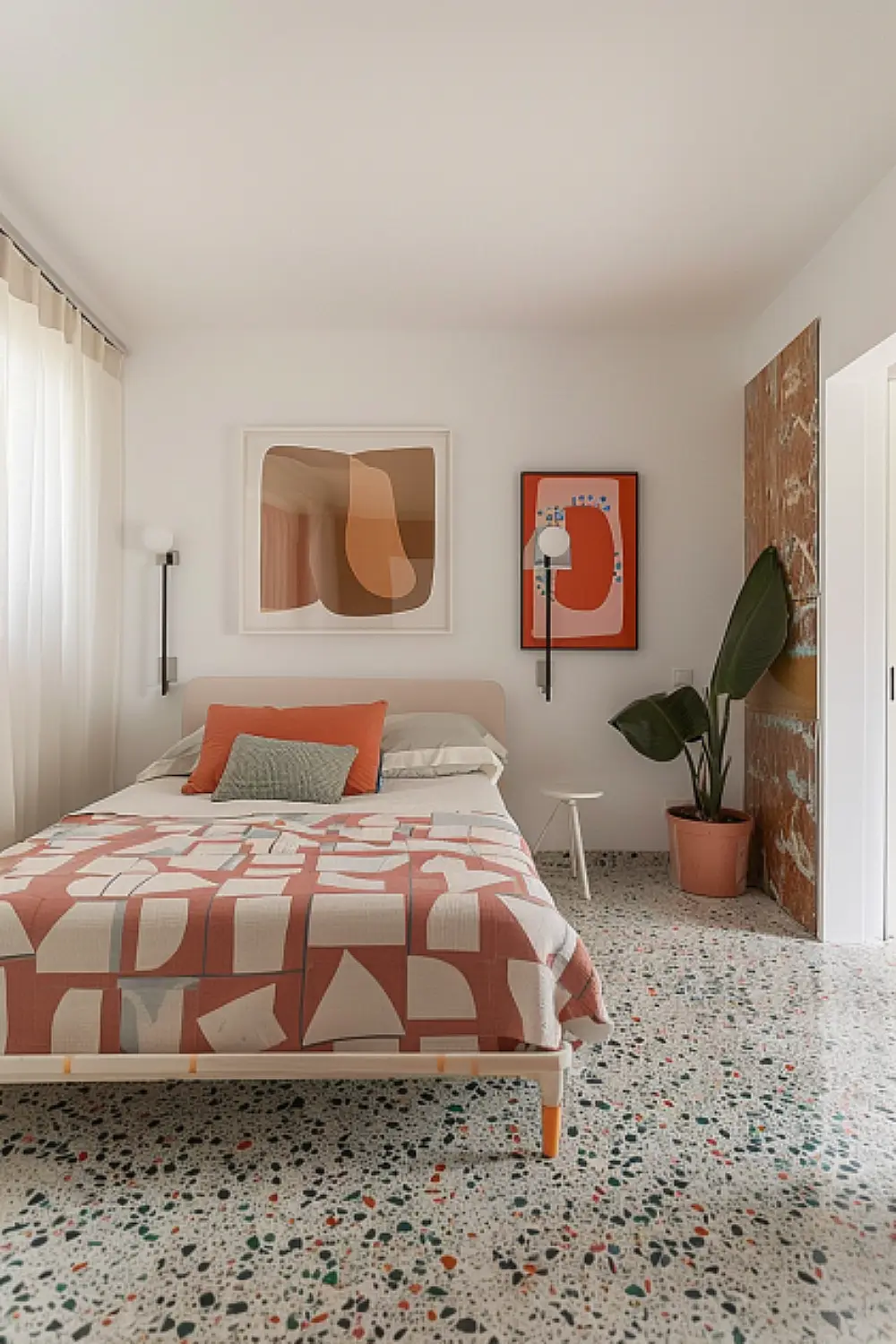 Bedroom with geometric patterns and terrazzo flooring