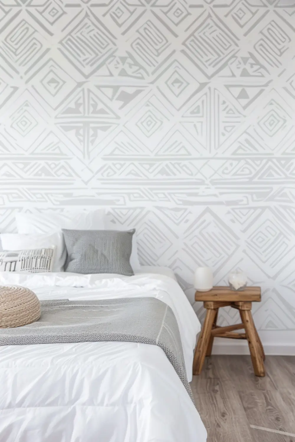 Geometric wallpaper in a modern boho bedroom