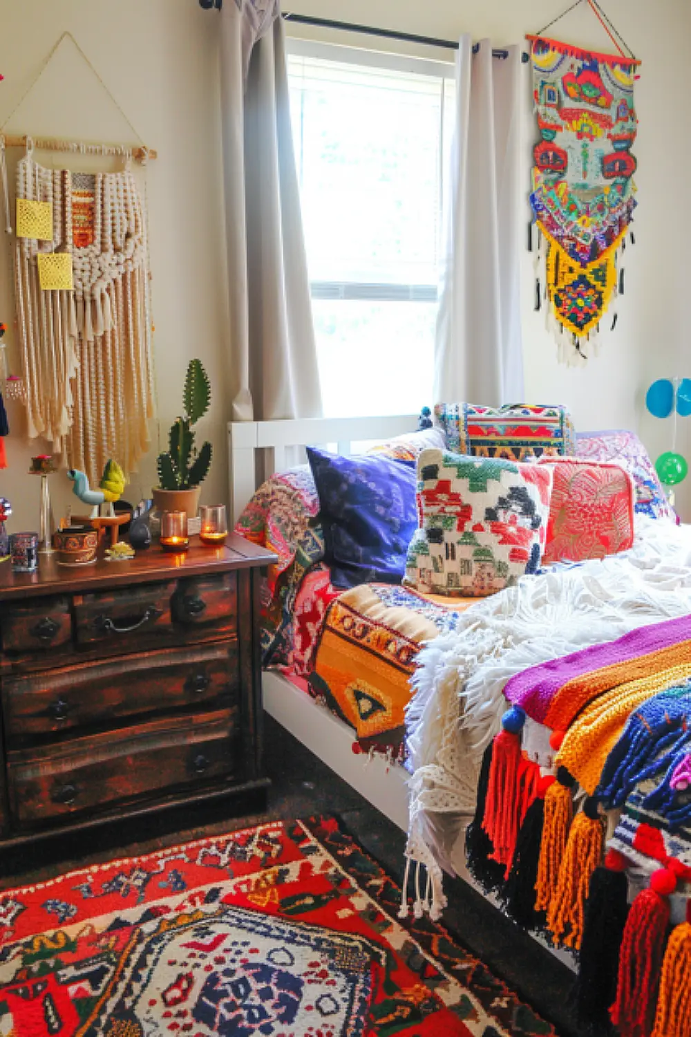 Bedroom decorated with small rainbow knick-knacks.