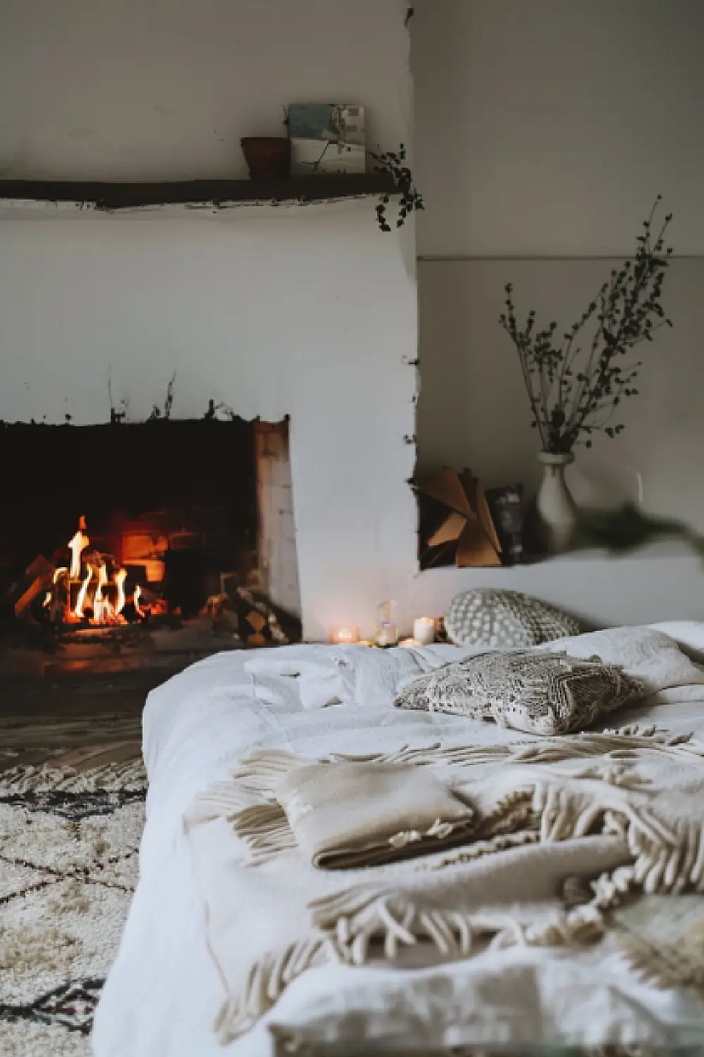 Scandinavian fireplace in boho bedroom